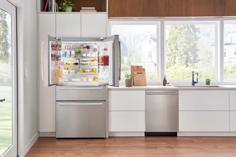 An open fridge in the kitchen of a St. Louis home.