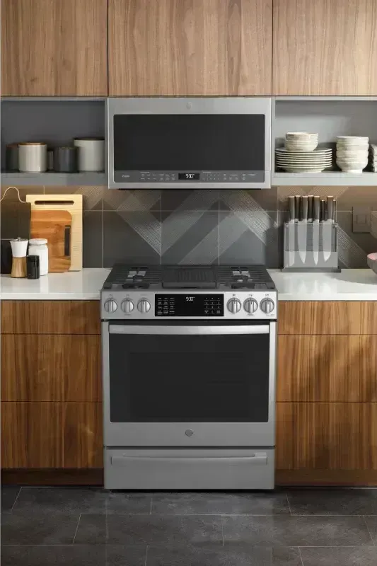 A gas oven inside of a home kitchen.